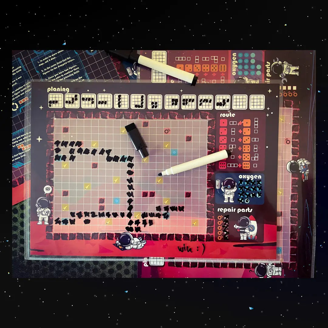 A photo of the "Micro Mars" Roll&Write game map with a marker pen, showing how players use the sheet and pen during gameplay. a4play.com